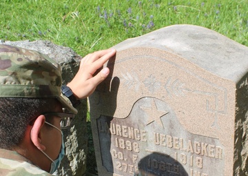 NY National Guard Soldiers repair World War 1 Guard Soldier's marker