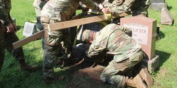 NY National Guard Soldiers repair World War 1 Guard Soldier's marker