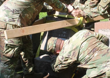 NY National Guard Soldiers repair grave market of Soldier who died in World War I