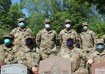 NY National Guard Soldiers repair World War 1 Guard Soldier's marker