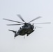 Helicopter support team transports AV-8B Harrier engine from USS Bataan