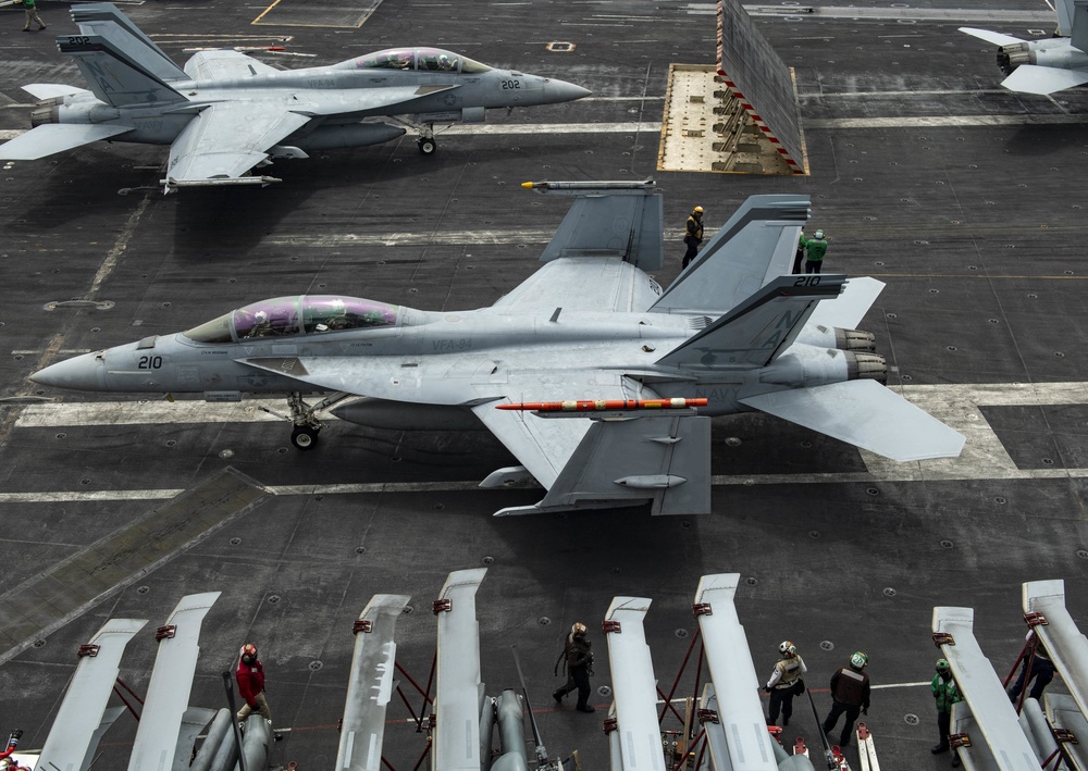 F/A-18E Super Hornets Prepare To Launch Off Nimitz' Flight Deck