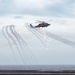 Nimitz CSG Helicopters Shoot Flares During Fly Over
