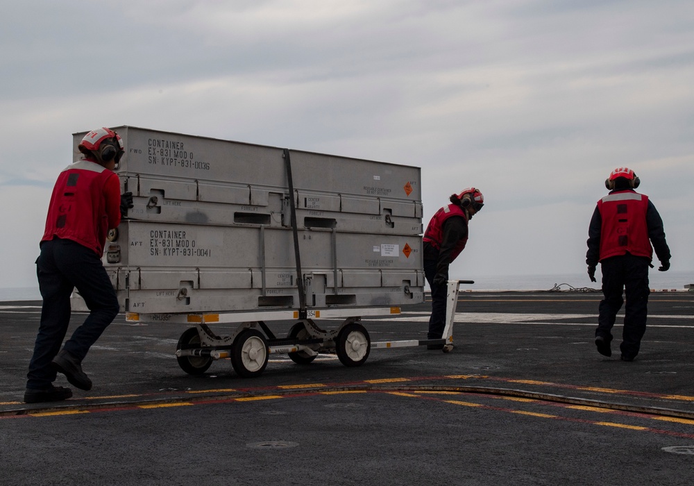 Sailors transport ordnance