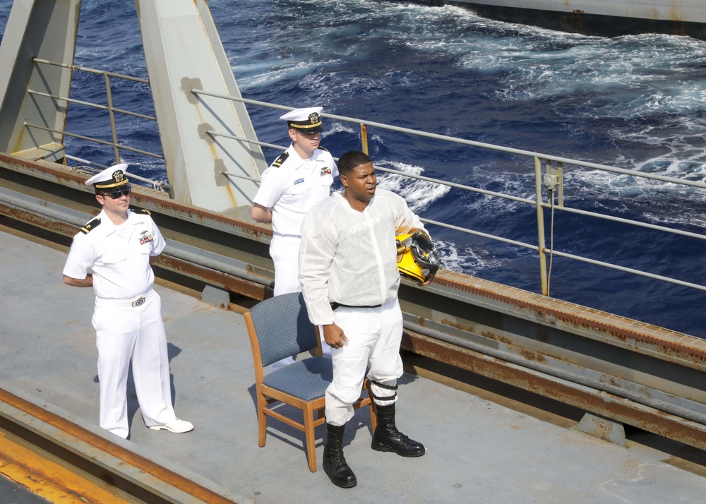 USS Emory S. Land Crew Members Perform Skit While in an Underway Replenishment with USNS Carl Brashear