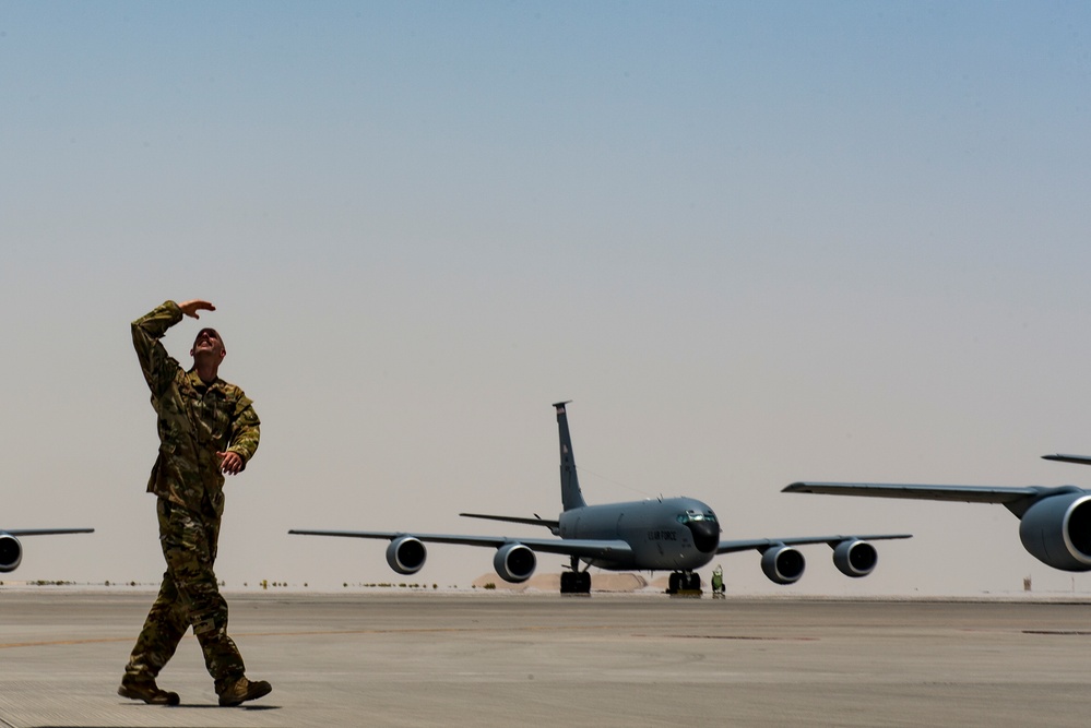 A U.S. Air Force KC-135 aircrew assigned to the 28th Expeditionary Air Refueling Squadron conducts an aerial refueling mission