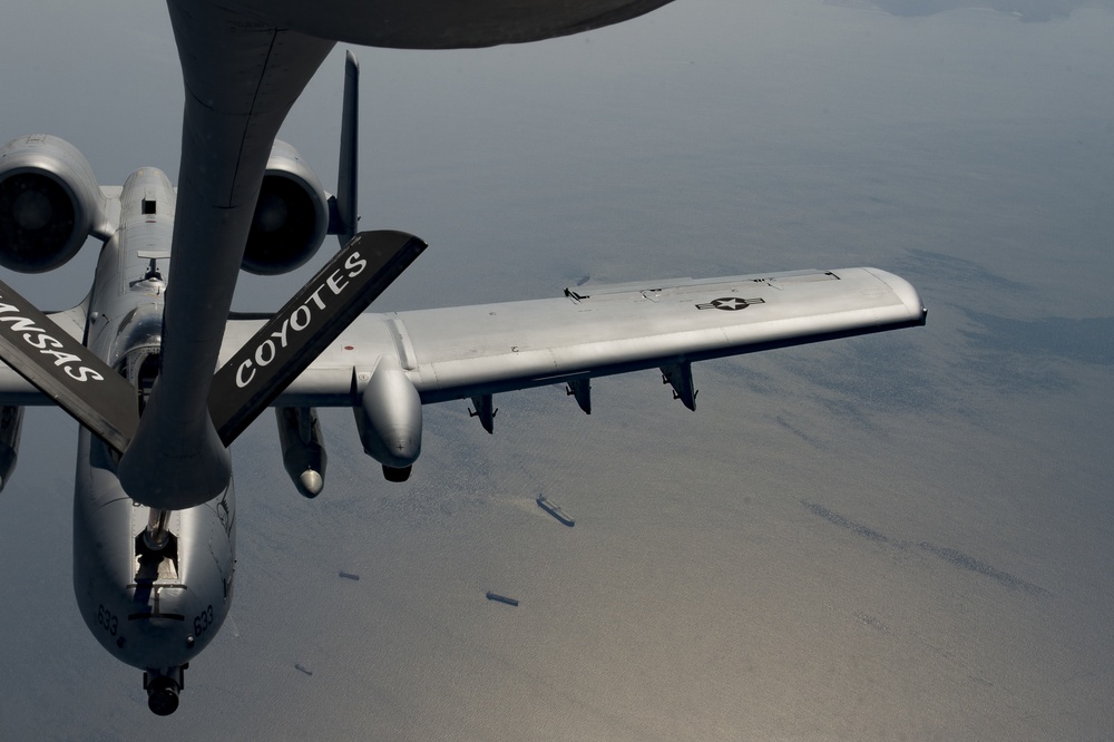 A U.S. Air Force KC-135 aircrew assigned to the 28th Expeditionary Air Refueling Squadron conducts an aerial refueling mission