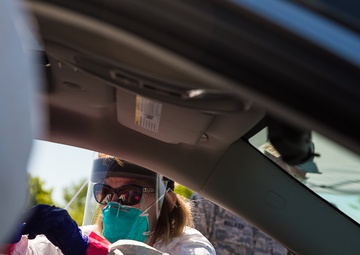 The Michigan National Guard conducts COVID-19 testing in city of Midland