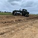 U.S. Navy Seabees with NMCB-5 resurface a runway at Ie Shima Training Facility