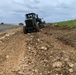 U.S. Navy Seabees with NMCB-5 resurface a runway at Ie Shima Training Facility