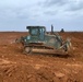 U.S. Navy Seabees with NMCB-5 resurface a runway at Ie Shima Training Facility