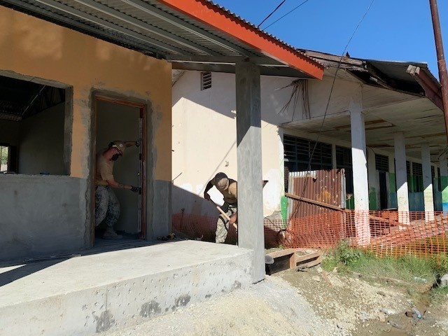 U.S. Navy Seabees with NMCB-5’s Detail Timor-Leste construct a two-room schoolhouse