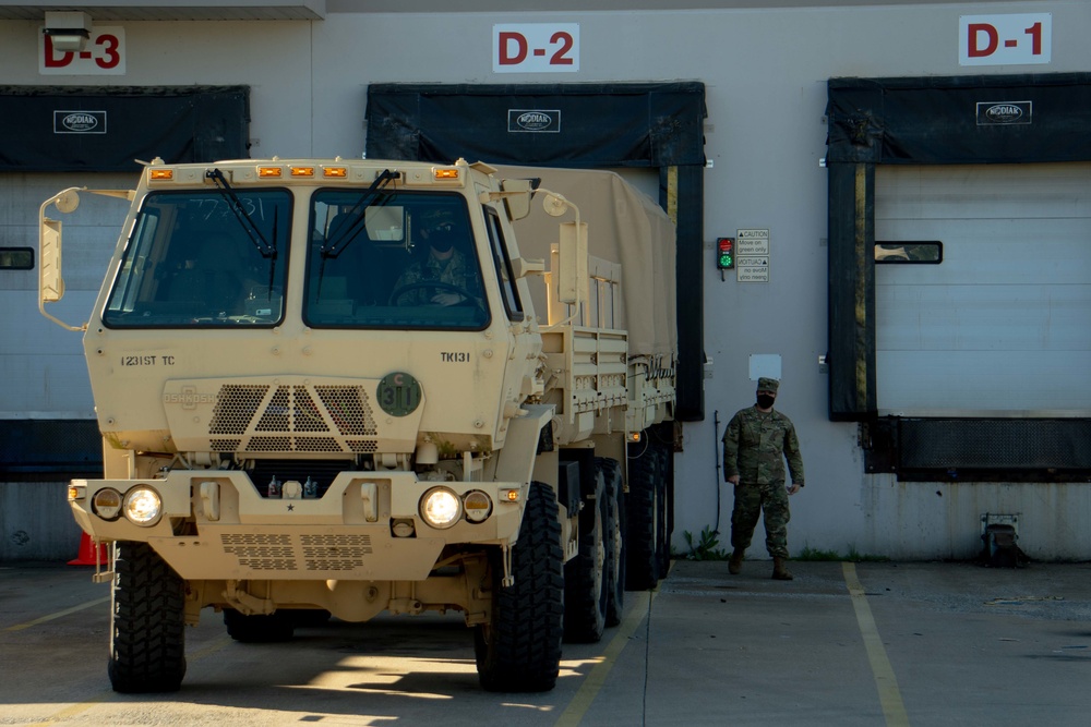 Soldiers transport donated groceries