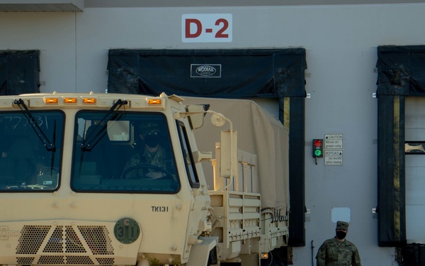 Soldiers transport donated groceries