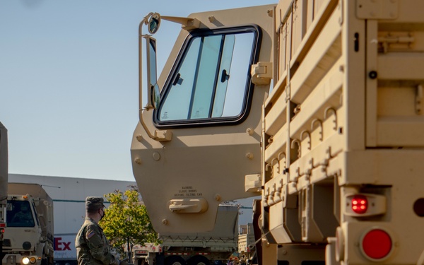 Soldiers transport donated groceries