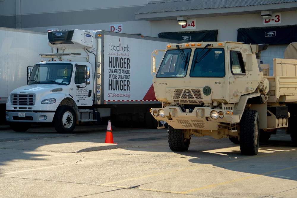 Soldiers transport donated groceries
