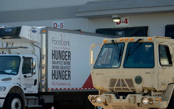 Soldiers transport donated groceries