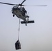 Sailors and Marines take part in a replenishment-at-sea