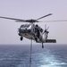 Sailors and Marines take part in a replenishment-at-sea