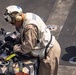 Sailors and Marines take part in a replenishment-at-sea