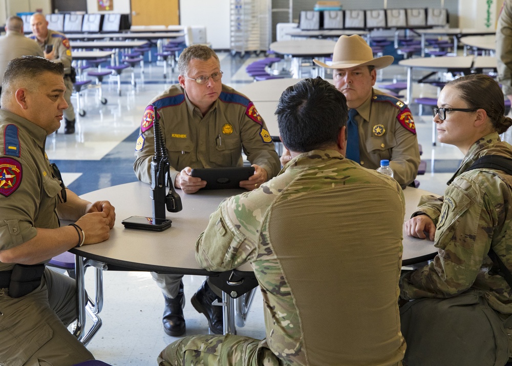 TXARNG Soldiers stand ready at the rally in Angelton, Texas