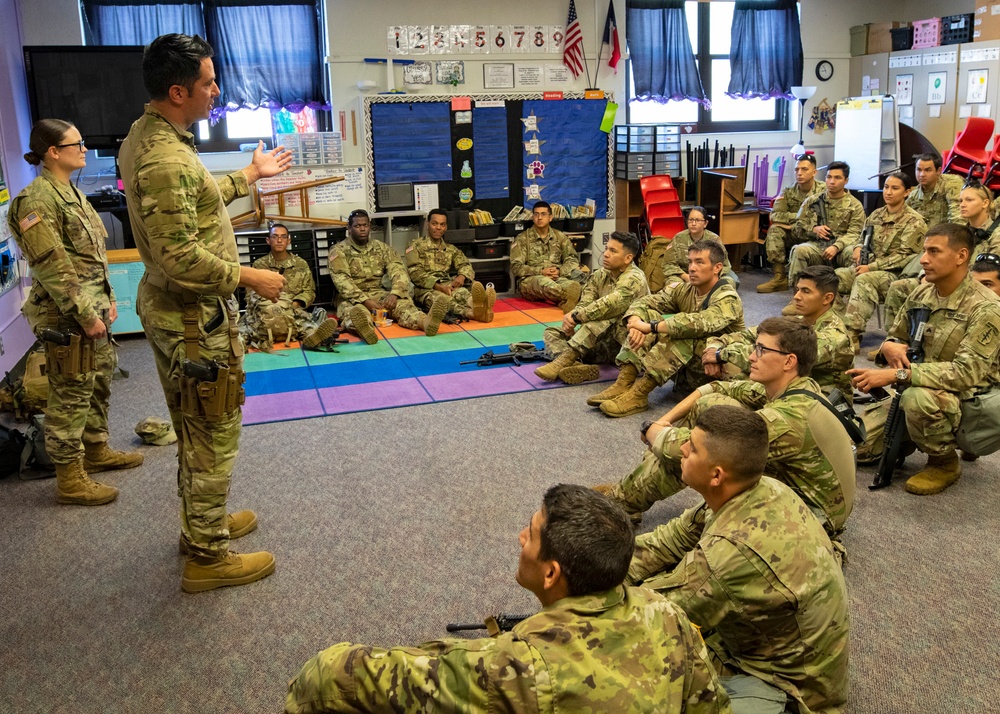 TXARNG Soldiers stand ready at the rally in Angelton, Texas