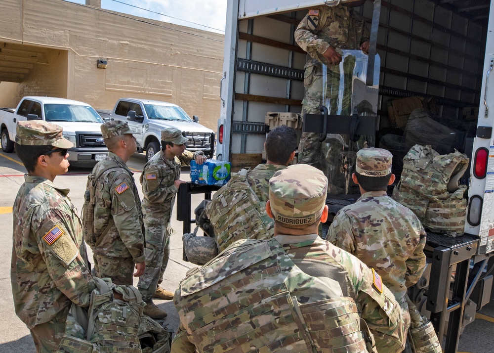 TXARNG Soldiers stand ready at the rally in Angelton, Texas
