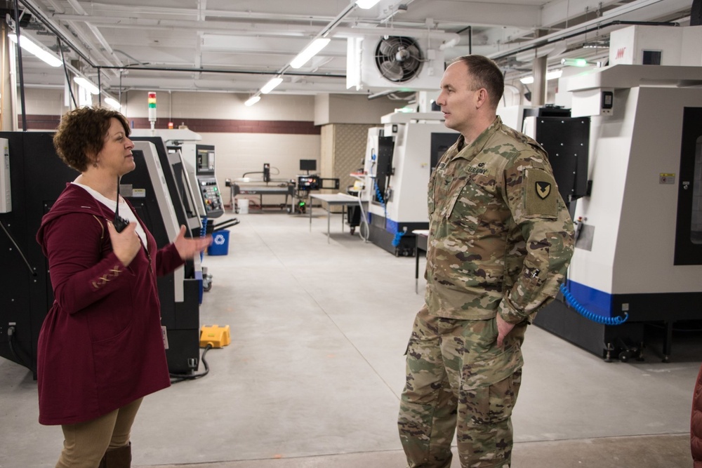 RIA factory team tours high school CNC program lab