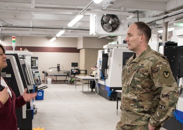 RIA factory team tours high school CNC program lab