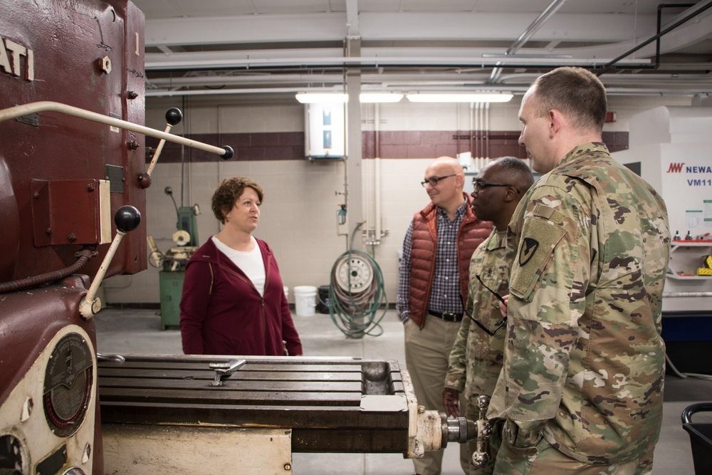 RIA factory team tours high school CNC program lab