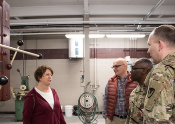 RIA factory team tours high school CNC program lab