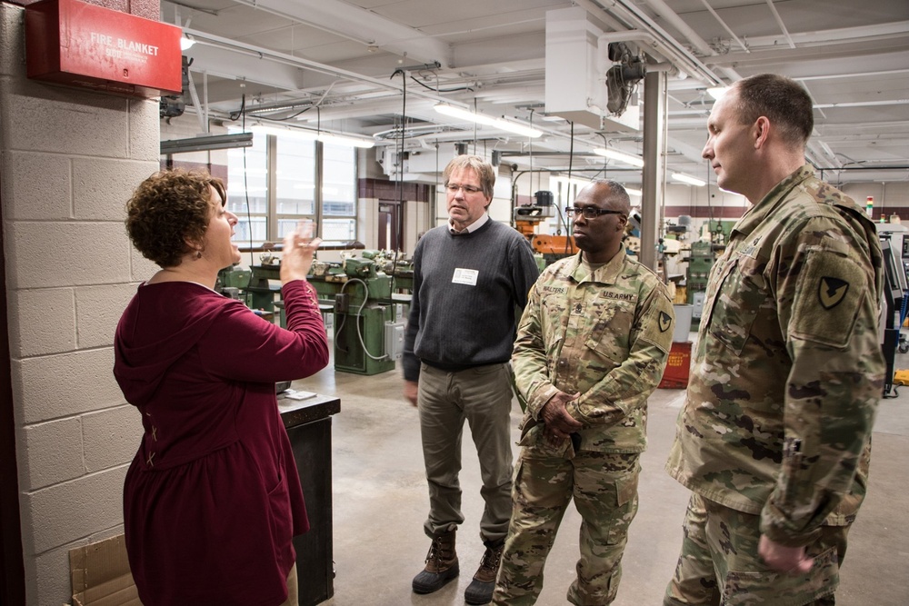 RIA factory team tours high school CNC program lab