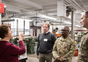 RIA factory team tours high school CNC program lab