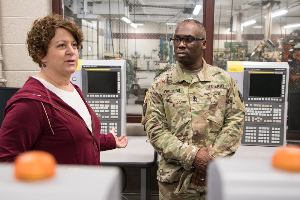 RIA factory team tours high school CNC program lab