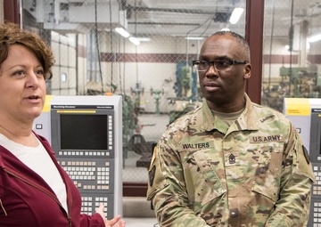 RIA factory team tours high school CNC program lab