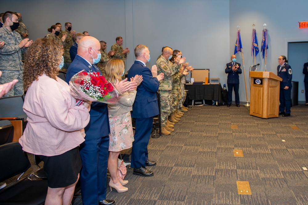 Congratulating new 157th Air Refueling Wing Command Chief