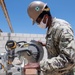 Seabees assigned to Naval Mobile Construction Battalion (NMCB) conduct a sewage line installation project for a kennel office building on board Naval Station Rota, Spain.