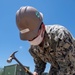 Seabees assigned to Naval Mobile Construction Battalion (NMCB) conduct a sewage line installation project for a kennel office building on board Naval Station Rota, Spain.