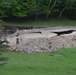 Engineers Inspect Failed Forest Lake Spillway Following Michigan Flooding