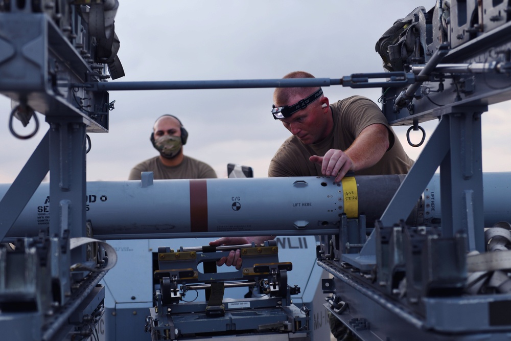 58th AMU loads live munitions for Combat Archer