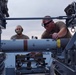 58th AMU loads live munitions for Combat Archer