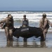 Reconnaissance and Explosive Ordnance Disposal Marines take the beach