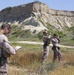 Reconnaissance and Explosive Ordnance Disposal Marines take the beach