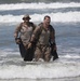 Reconnaissance and Explosive Ordnance Disposal Marines take the beach