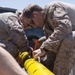 Reconnaissance and Explosive Ordnance Disposal Marines take the beach