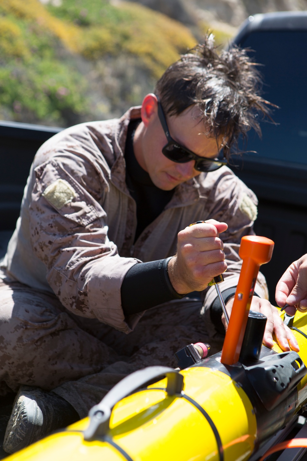 Reconnaissance and Explosive Ordnance Disposal Marines take the beach