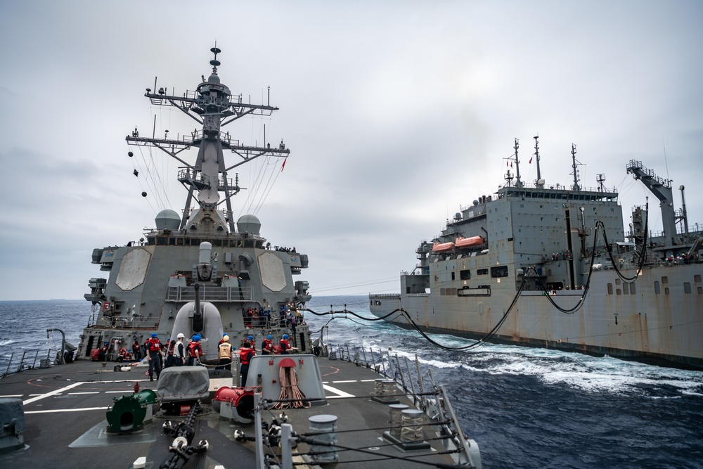 USS Barry conducts underway replenishment with USNS Carl Brashear