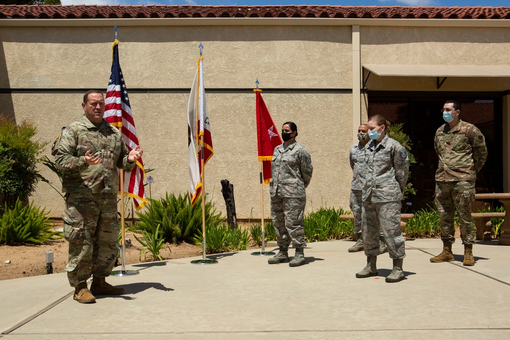 Adjutant General reenlists Airmen at 163d Attack Wing