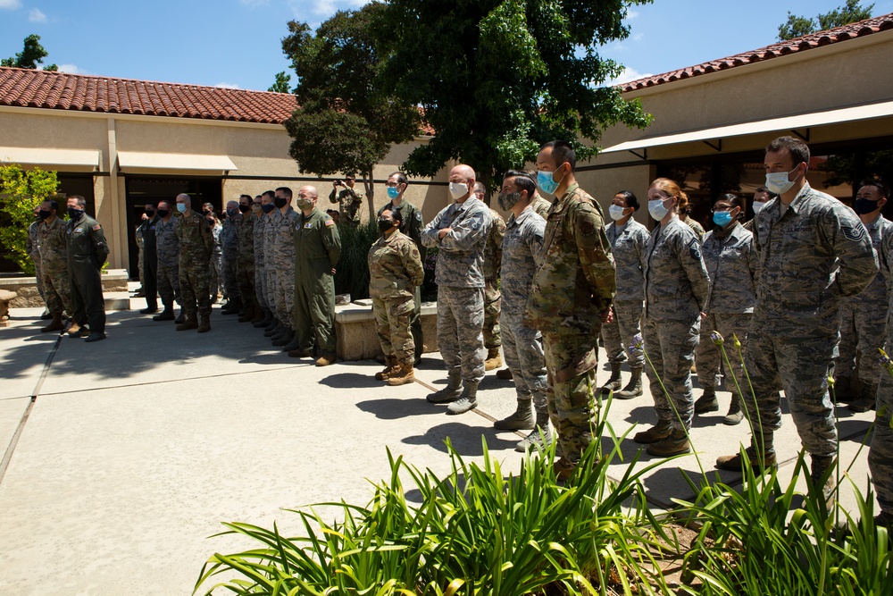 Adjutant General reenlists Airmen at 163d Attack Wing