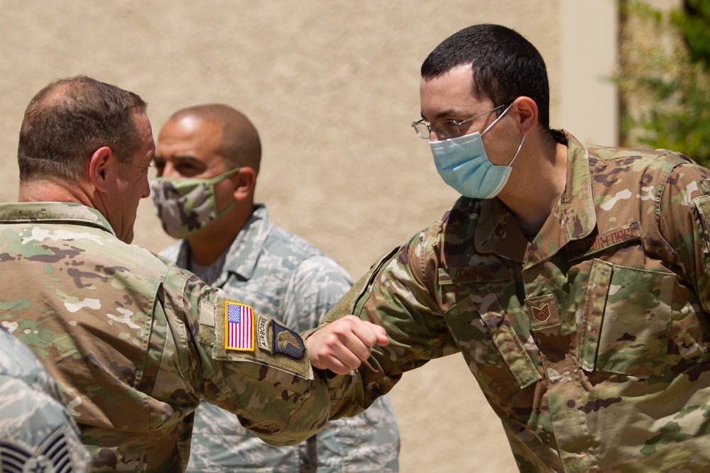 Adjutant General reenlists Airmen at 163d Attack Wing